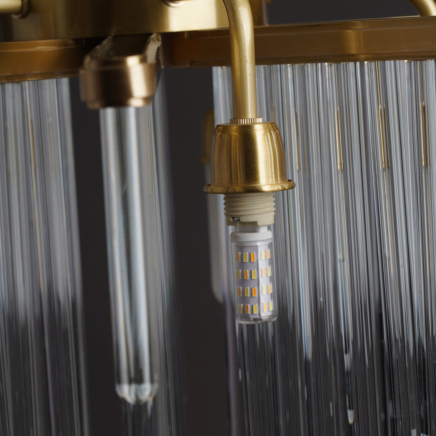Modern linear brass chandelier
